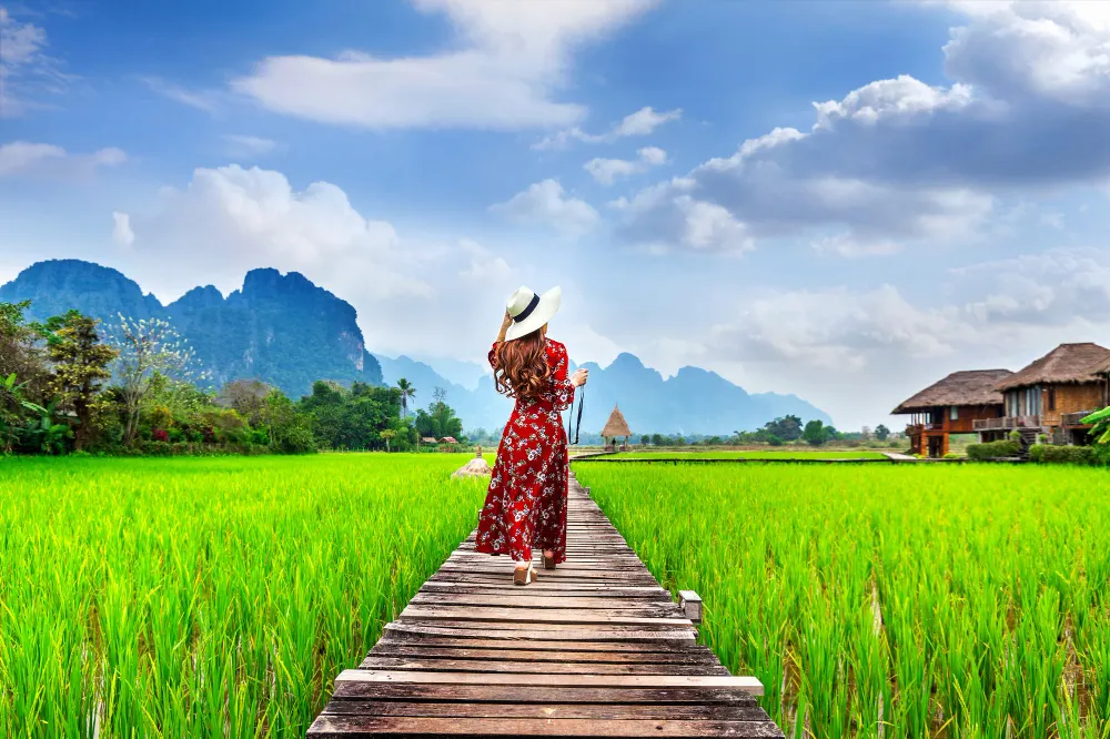 young-woman-walking-in-vang-vieng-laos