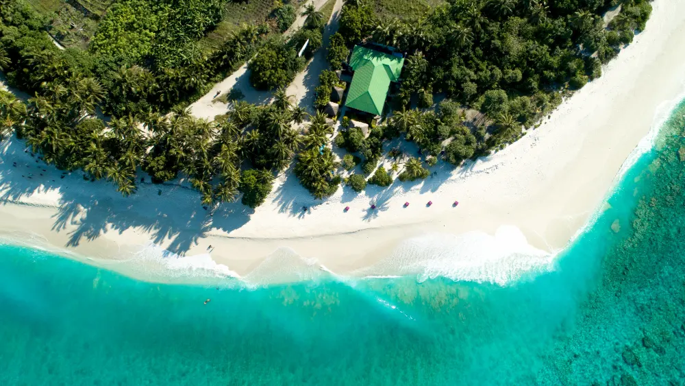 aerial-shot-maldives-showing-amazing-beach-clear-blue-sea-jungles