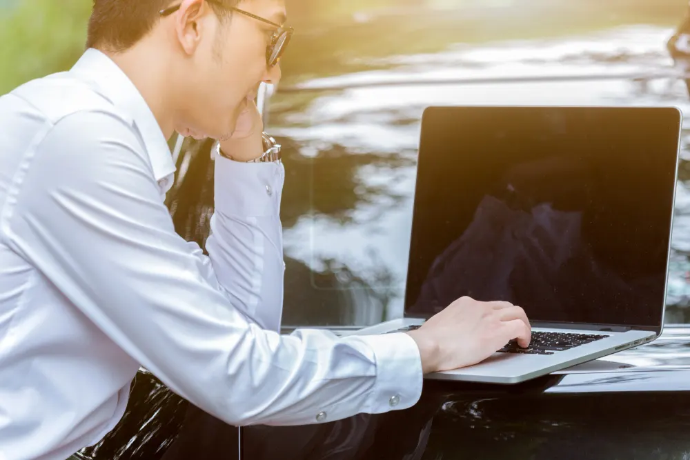 business-men-work-with-laptops-side-car