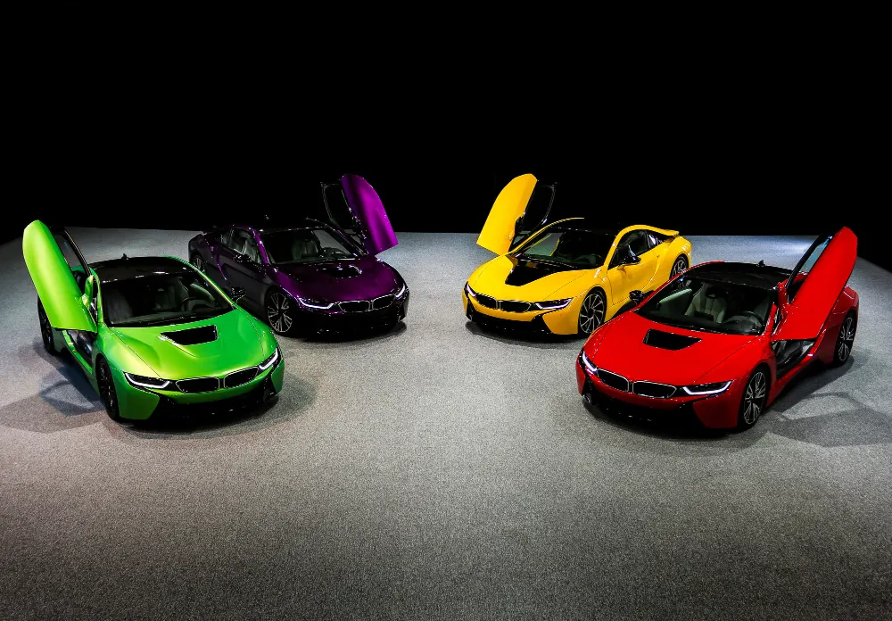 green-yellow-red-purple-violet-sedan-sport-cars-standing-dark-space