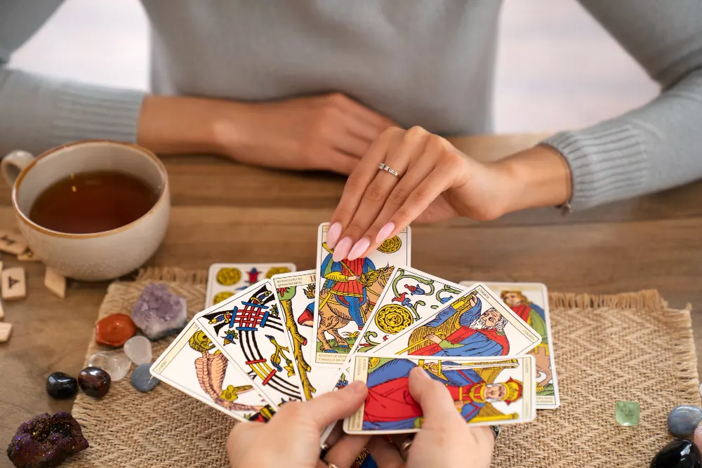 high-angle-woman-reading-tarot