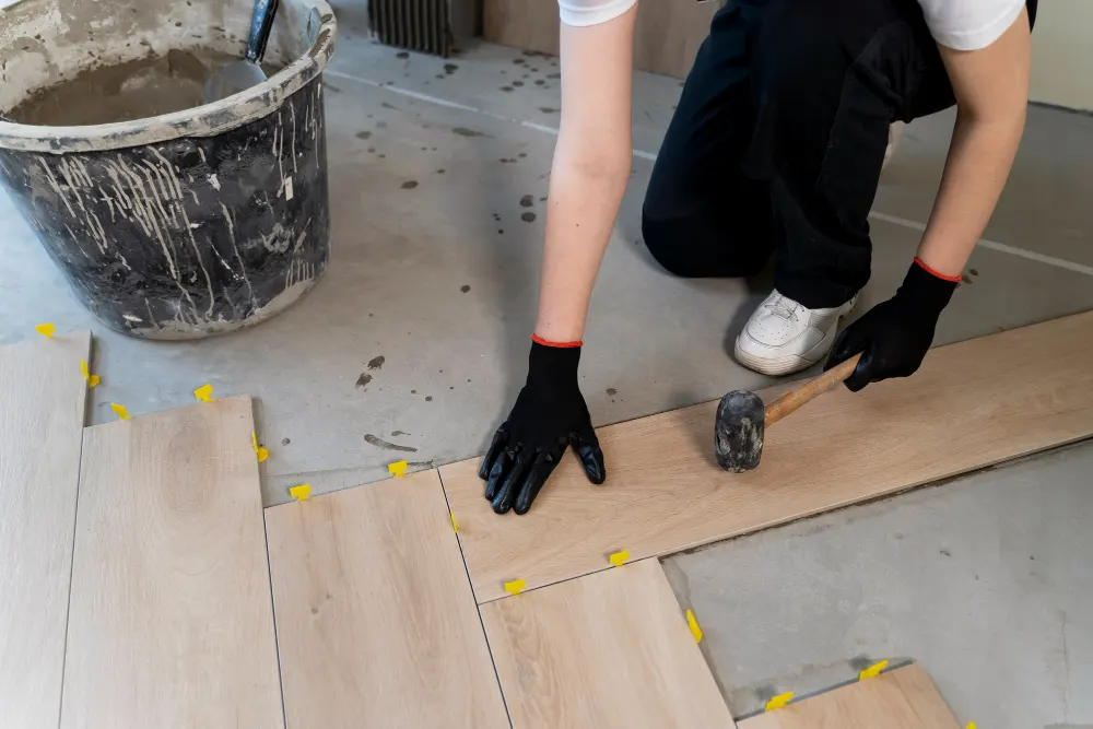 high-angle-worker-tiling-floor