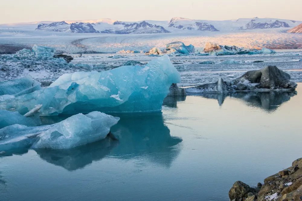 icebergs-near-frozen-water-snowy-jokulsarlon-iceland