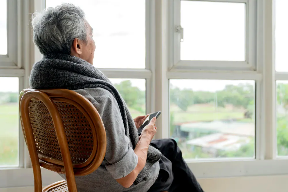 lonely-senior-elderly-man-male-enjoying-looking-out-window-home