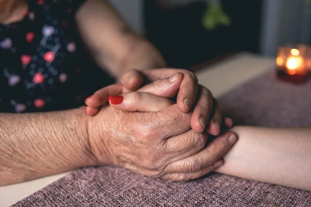 old-young-man-holding-hands-close-up