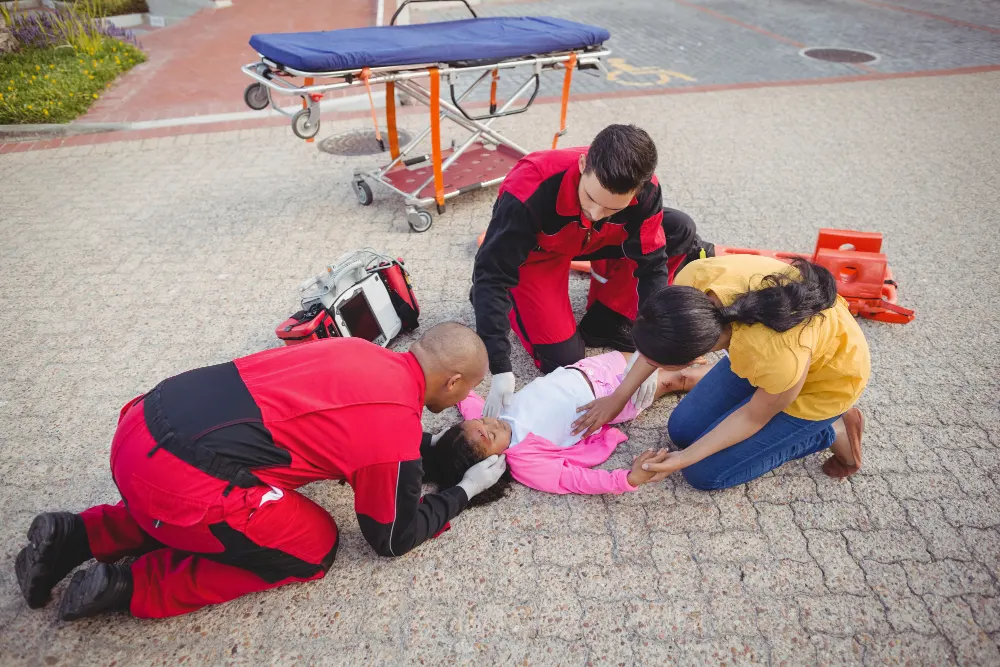 paramedics-examining-injured-girl