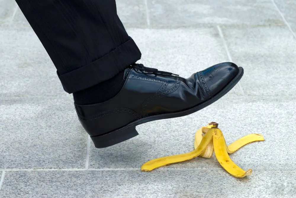 person-is-going-step-banana-peel