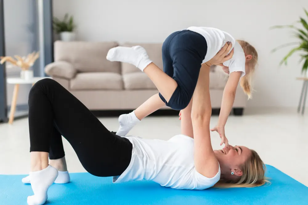 side-view-mother-child-exercising-home