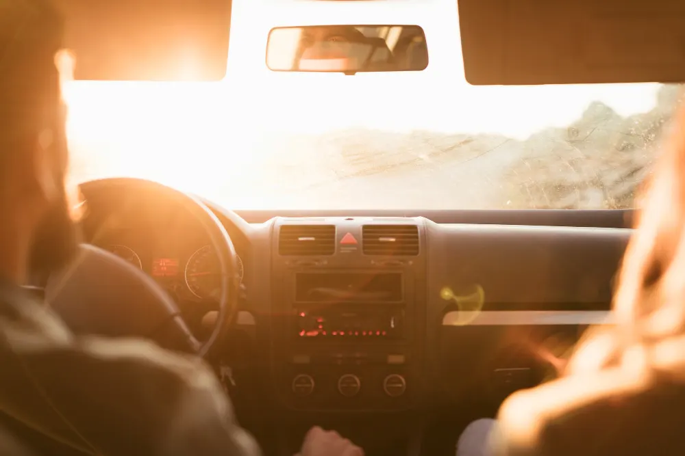 couple-driving-among-hot-temperature