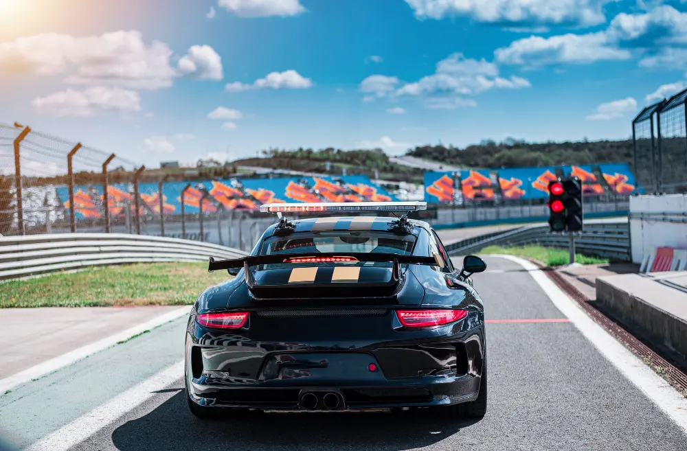 black-cabriolet-sport-sedan-car-with-two-yellow-stripes