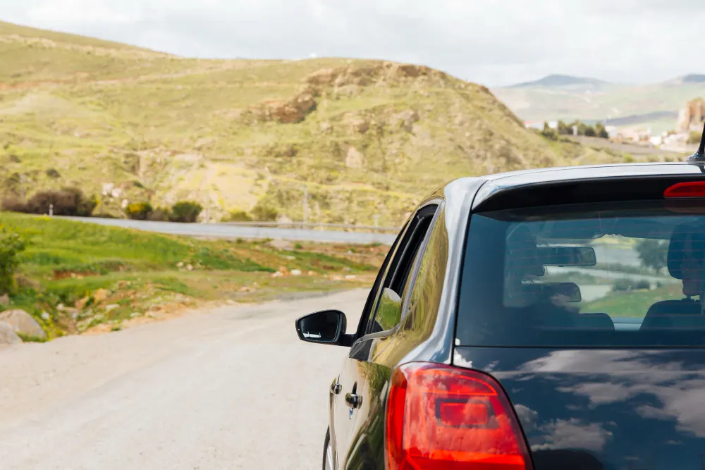 car-riding-on-road-in-nature