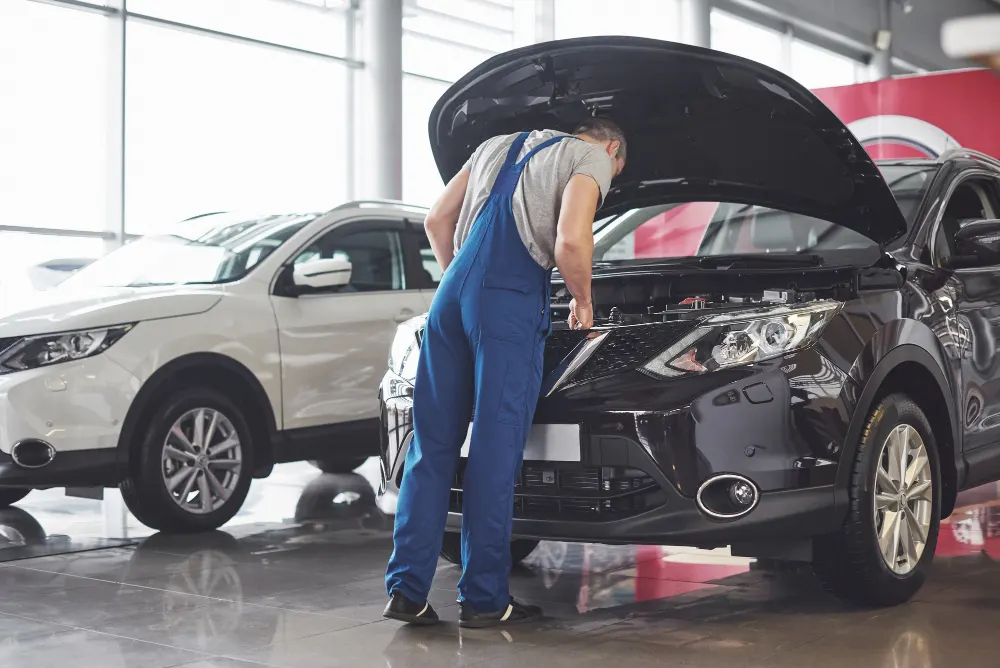 car-service-worker-checking-vehicle