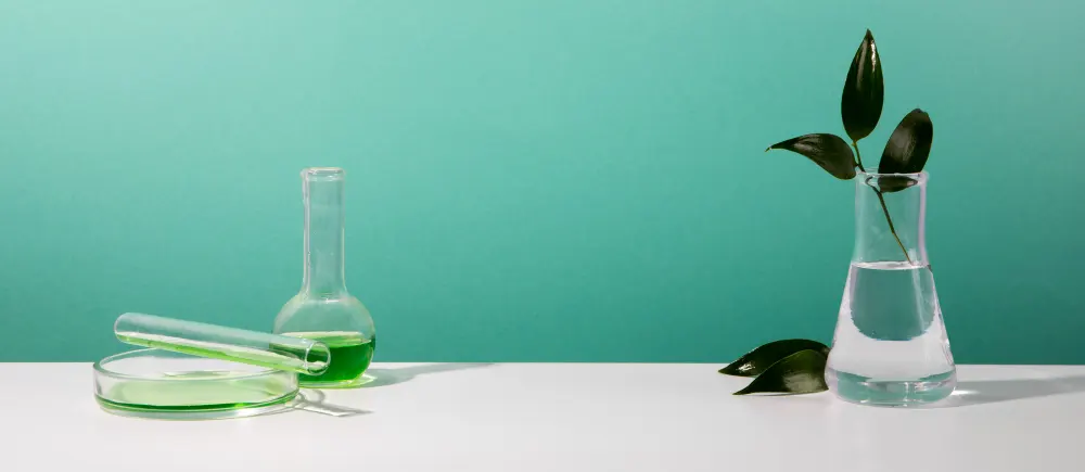 close-up-blurry-researcher-holding-glassware