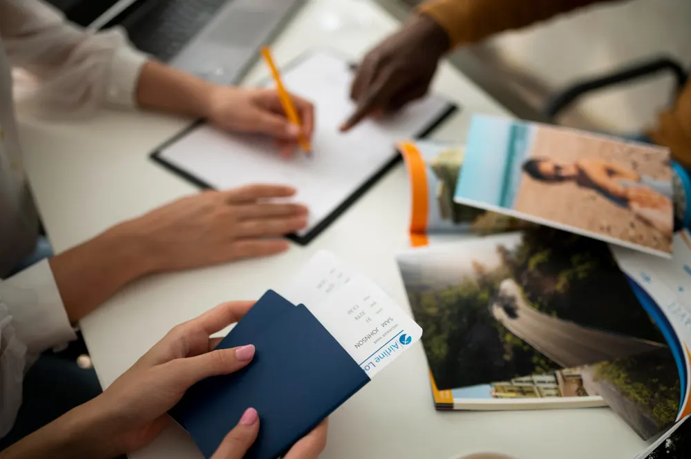 close-up-hand-signing-document-with-pencil