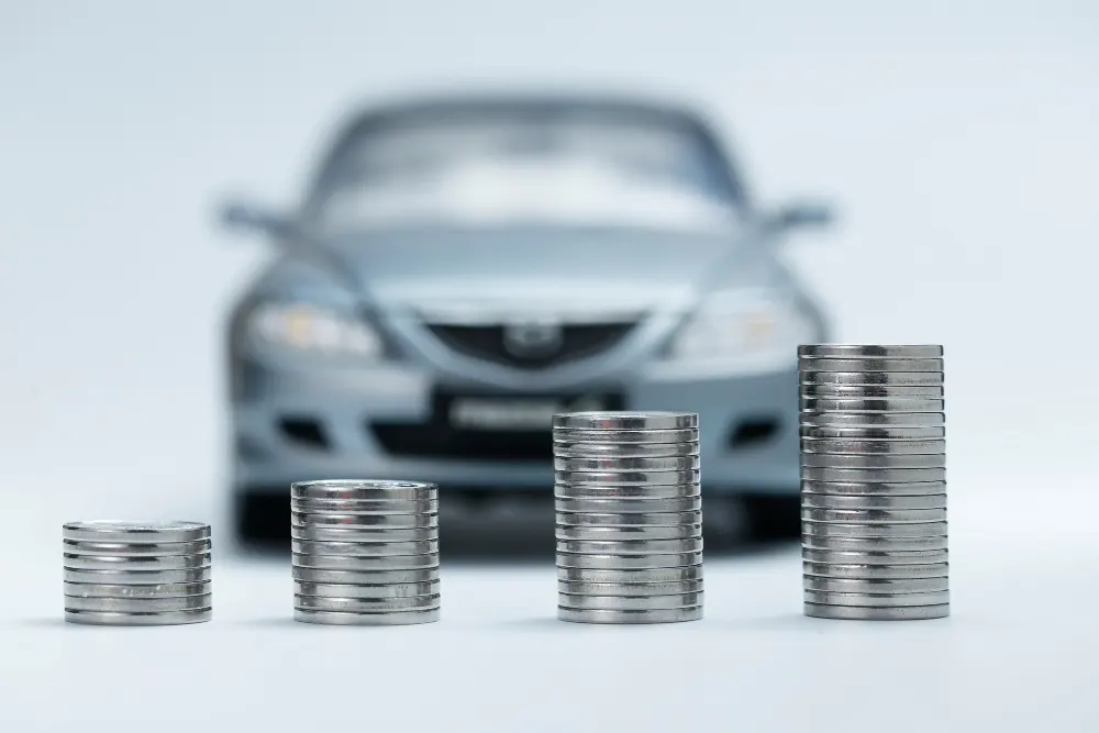 coin-stacks-in-front-of-car