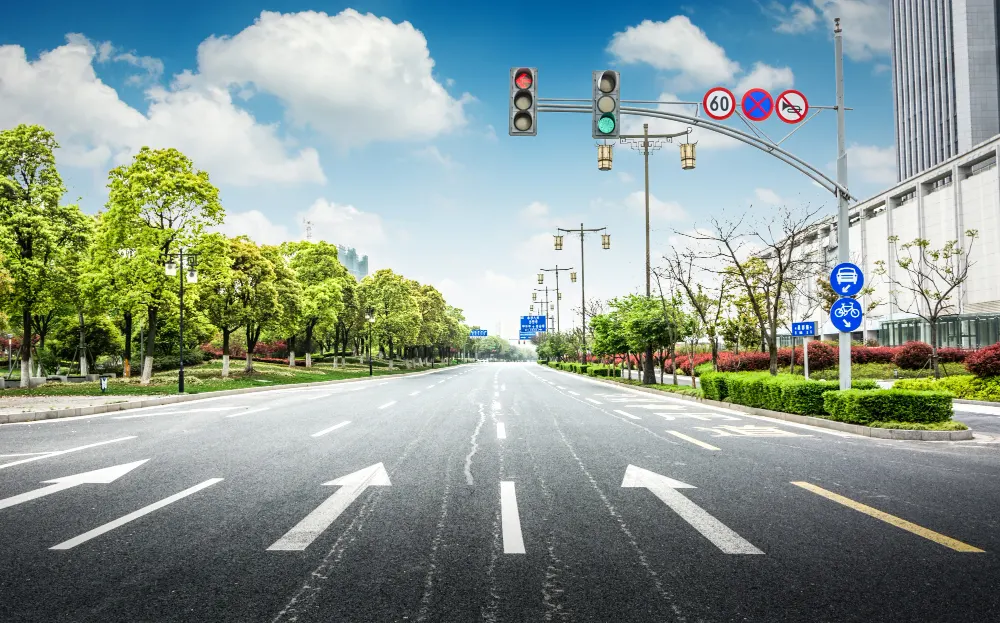 empty-asphalt-road-through-modern-city