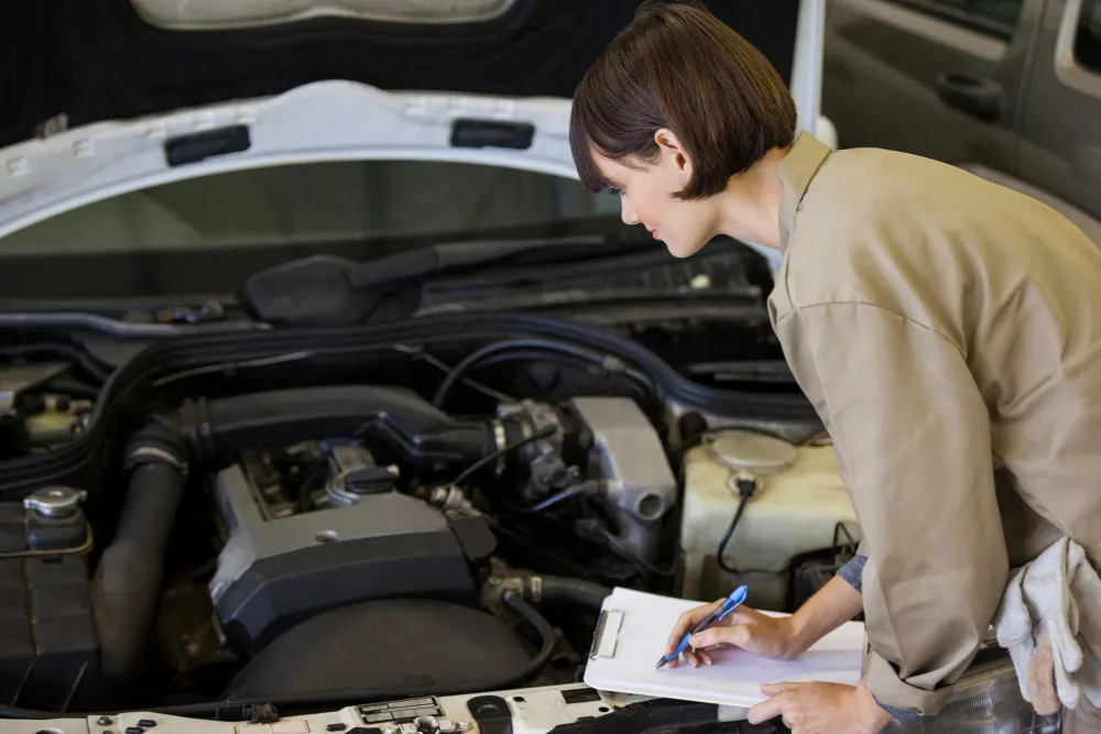 female-mechanic-preparing-checklist