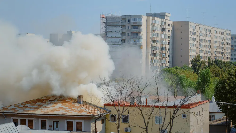 flame-going-out-from-burning-house