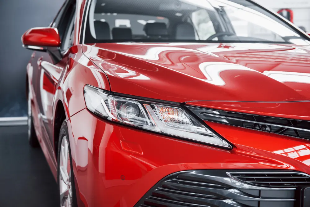 headlight-of-new-red-car