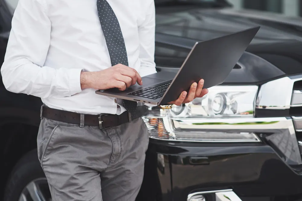 man-is-a-man-working-on-a-laptop-and-testing-on-mobile-devices