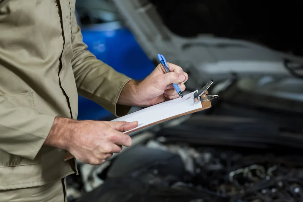 mechanic-worker-checking-a-car