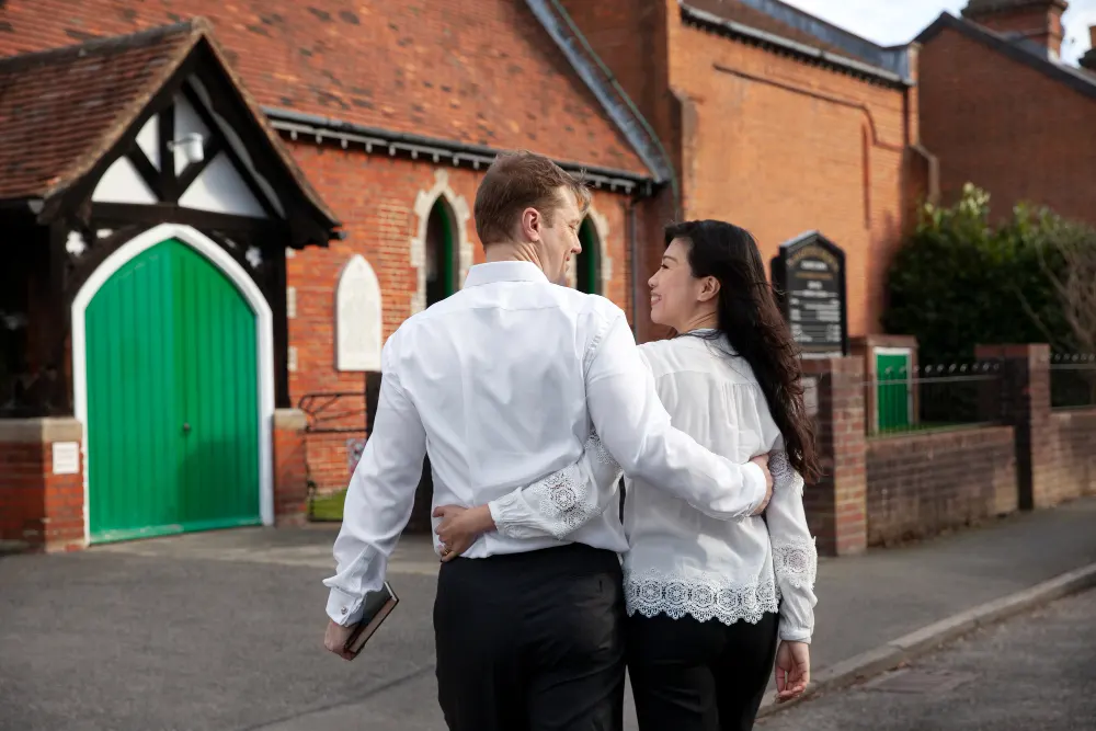 medium-shot-couple-together-front-of-home