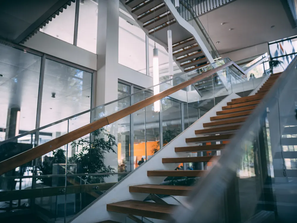 modern-room-with-a-wooden-staircase-during-daytime