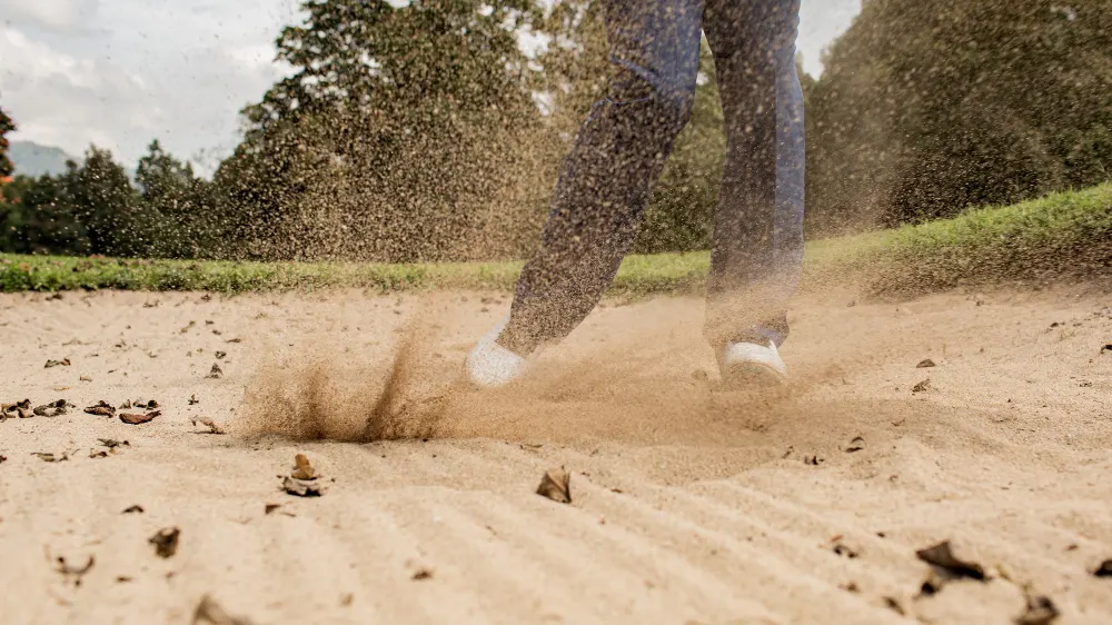 professional-golfer-hits-the-ball-from-the-sand-trap-Bali-Inodesia