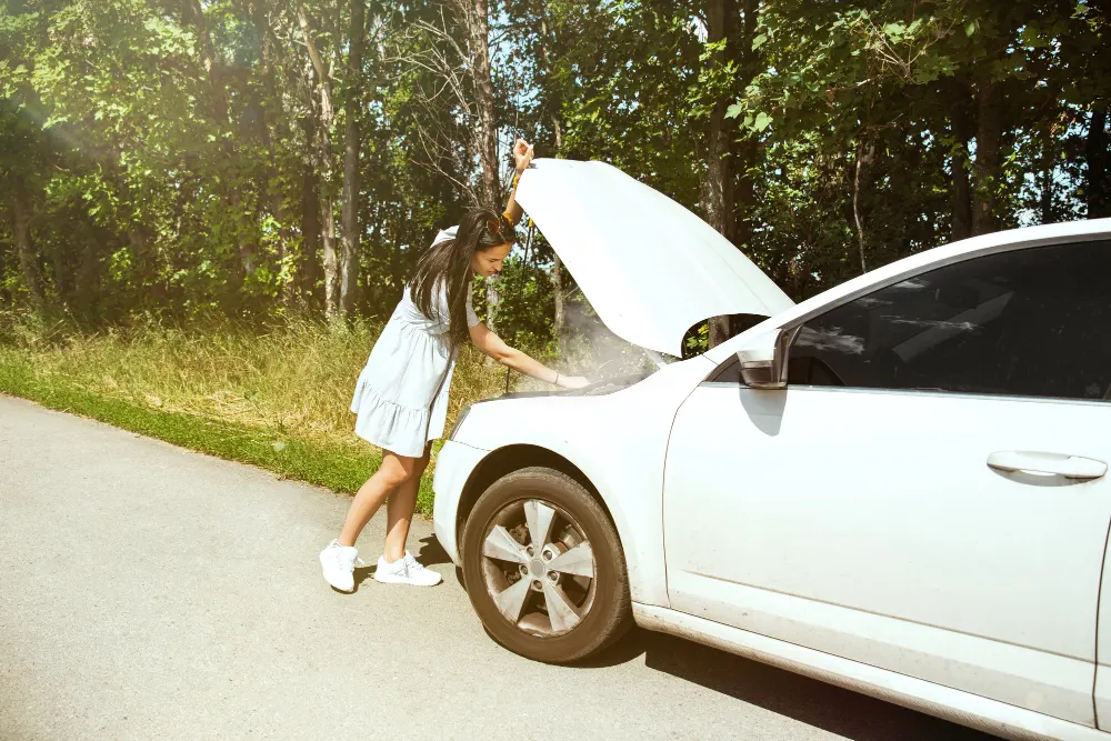 the-young-woman-broke-down-the-car-while-traveling-on-the-way-to-rest