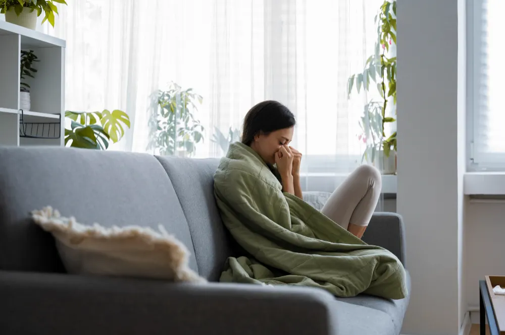 woman-sitting-on-the-couch