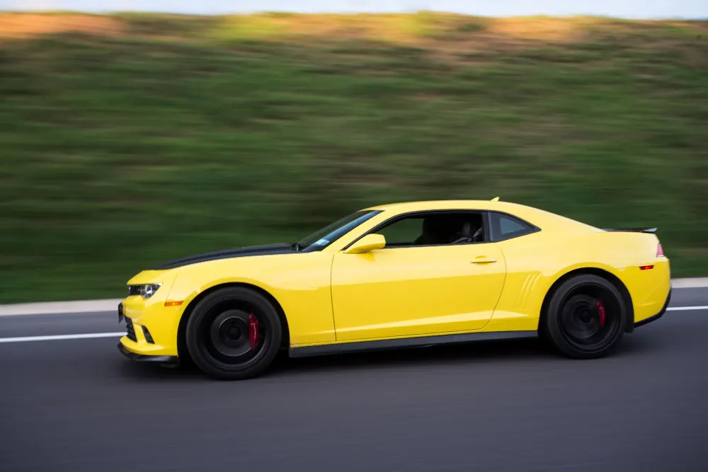 yellow-sport-sedan-on-the-road