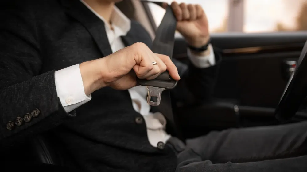 young-uber-driver-in-car-interior