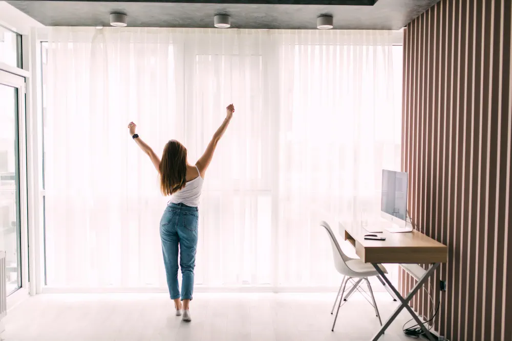 young-woman-stretching-at-home