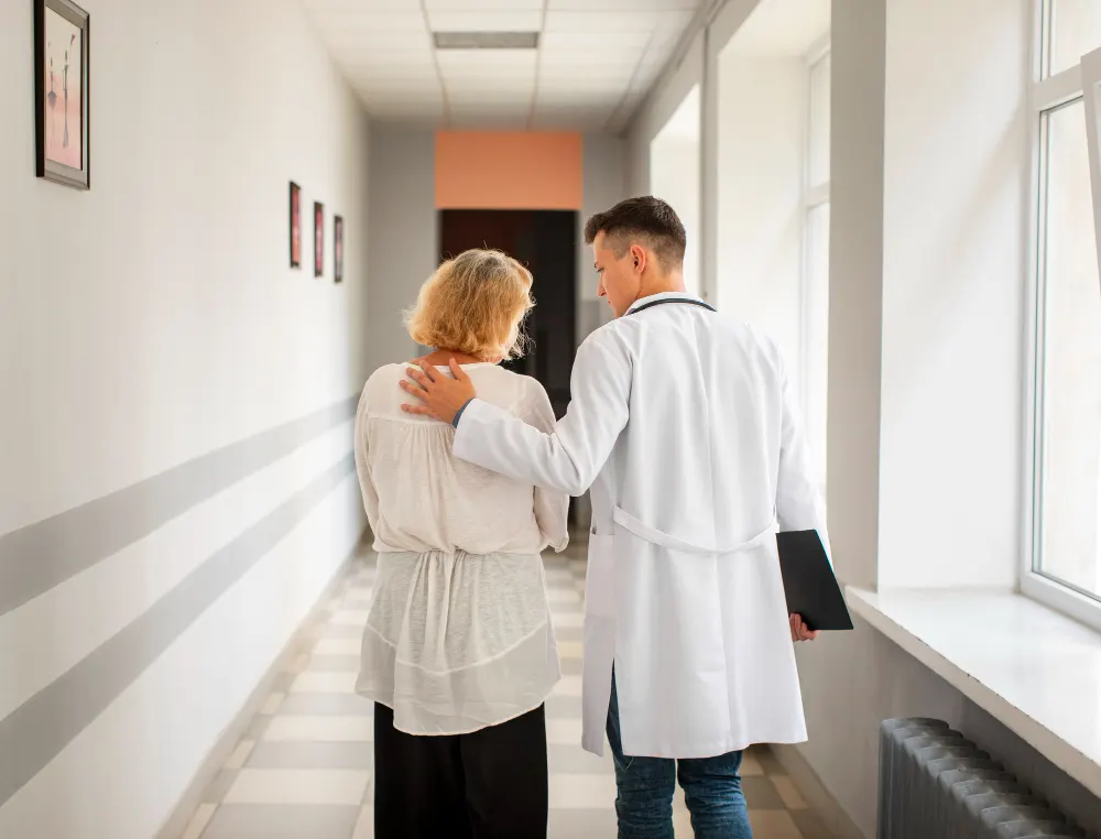 backview-doctor-and-senior-woman