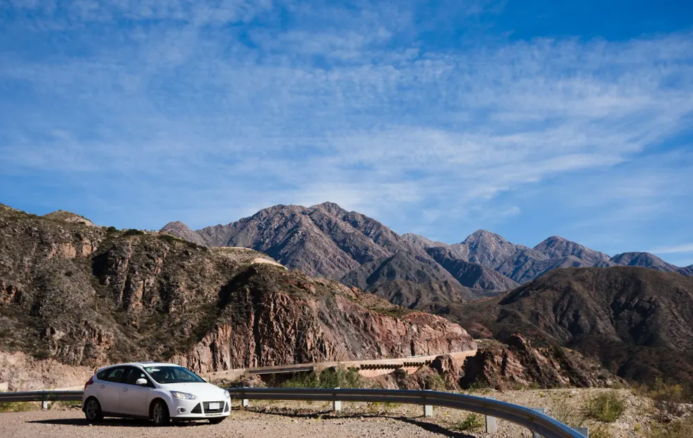 car-and-front-of-mountain-and-sky