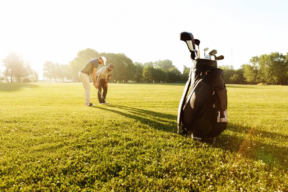 male-coaching-golf