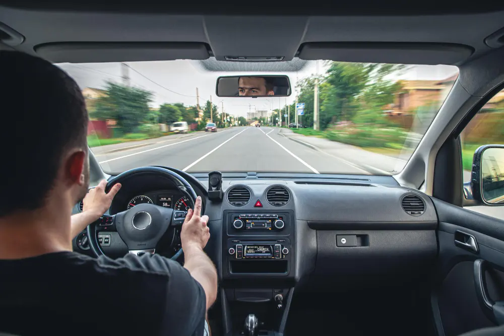 man-driving-on-road