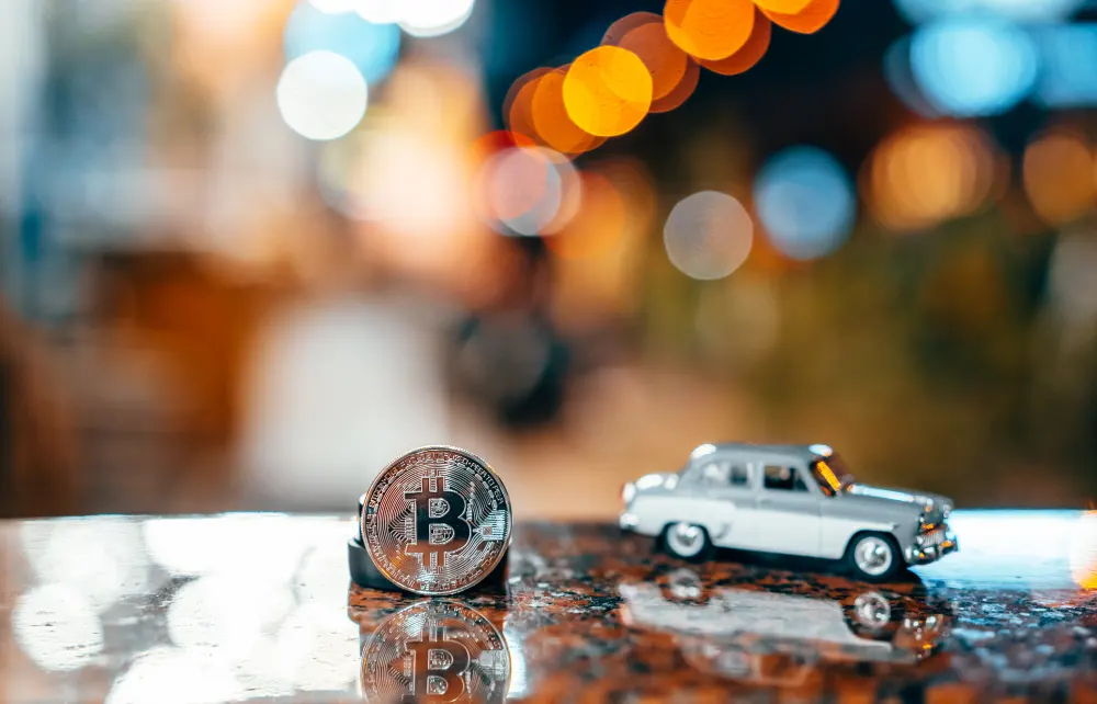 silver-bitcoin-and-moskvich-on-the-table-glowing