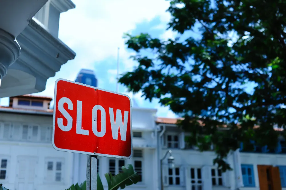 red-slow-sign-on-the-road