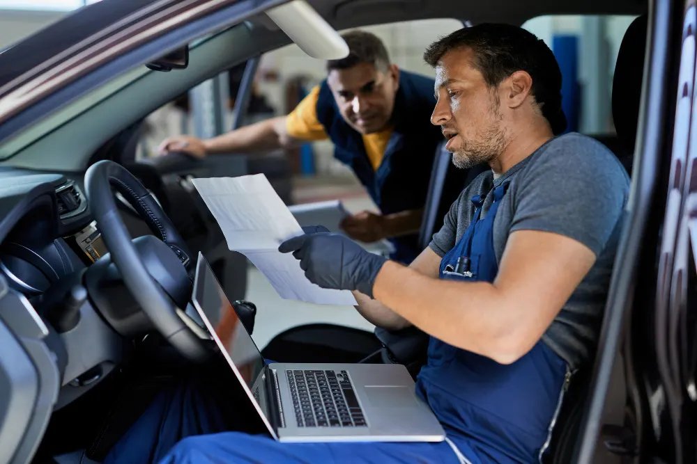 running-car-diagnostic-and-analyzing-data-in-a-workshop