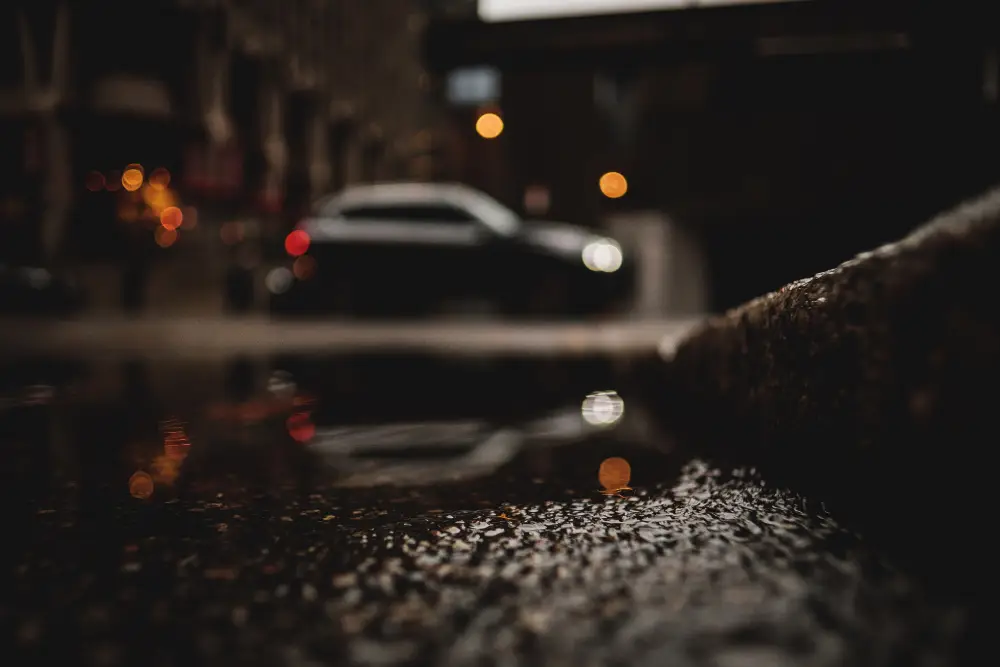 a-low-angle-shot-of-a-car-with-reflection