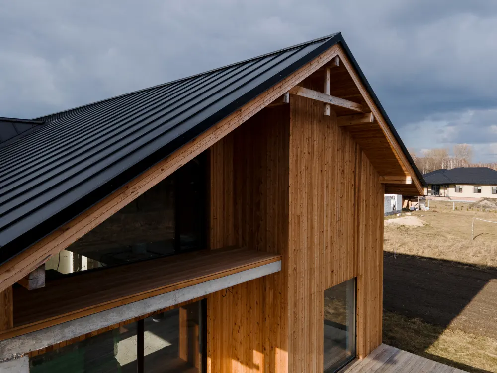 Beautiful-wooden-house-with-dark-roof