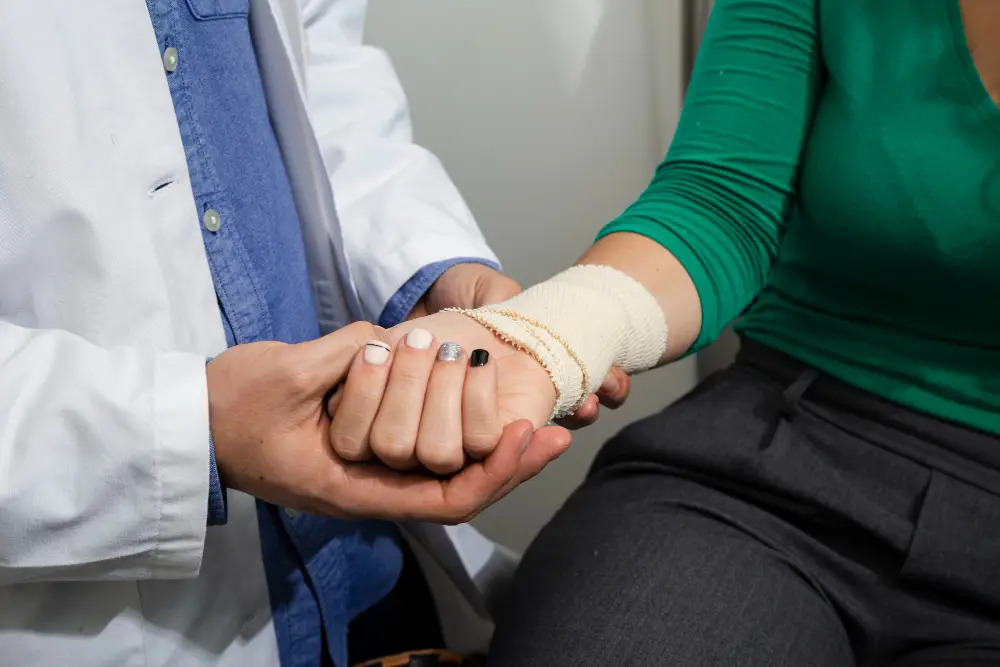 Doctor-checking-bandaged-arm