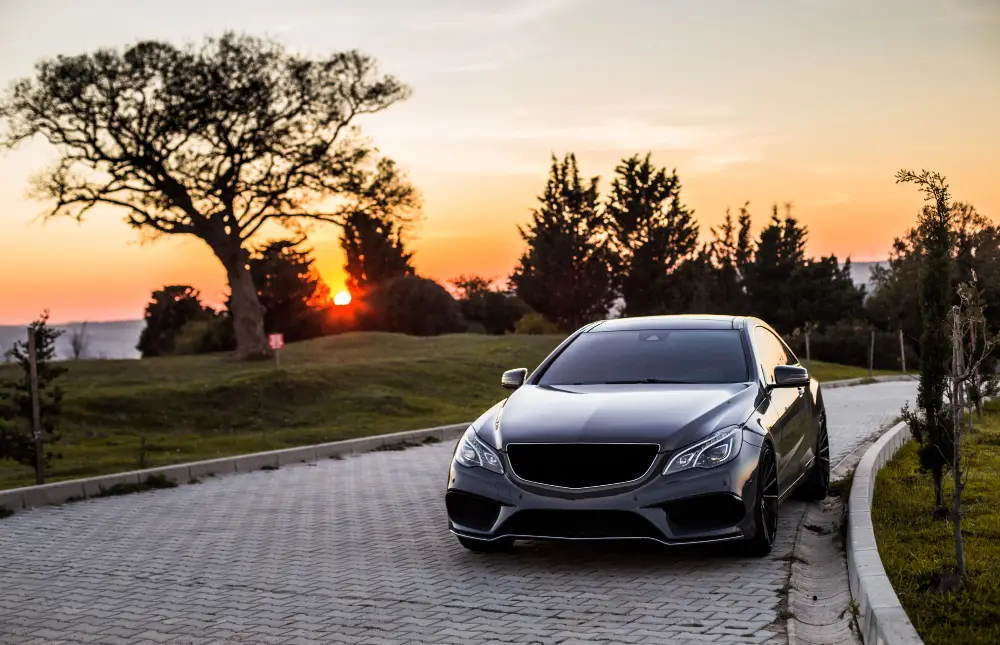 Grey-luxurios-Sedan-car-in-the-sunset