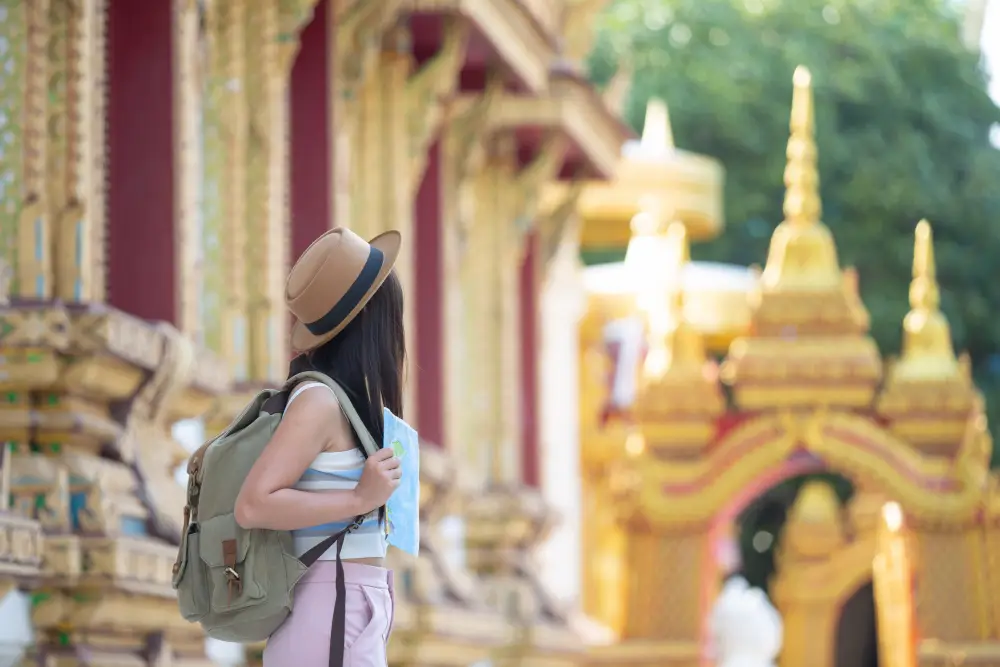 female-tourists-hold-a-map-to-find-places