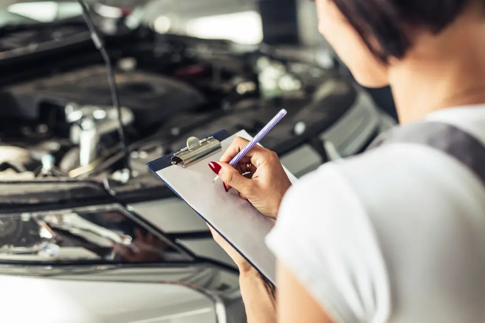 high-angle-woman-feeling-car-service-form