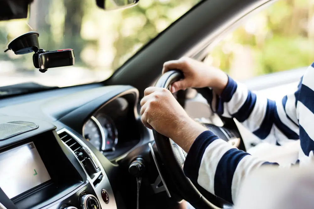 man-driving-a-family-car